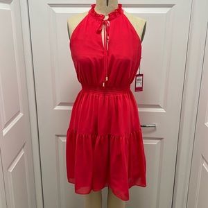 Vince Camuto halter, ruffle trim, tie neck, smocked waist, flounce hem dress.